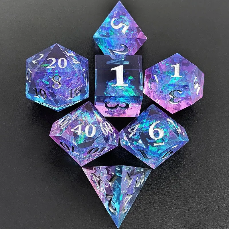 Seven purple and blue polyhedral dice with silver-coloured numerals on a dark surface