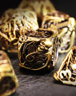 Load image into Gallery viewer, Gold Skull Metal Hollow DND Dice 7 Set
