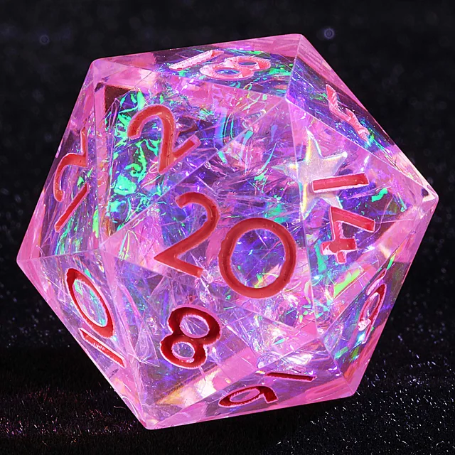 Close-up of a transparent pink D20 with iridescent inclusions and pink-red numerals.