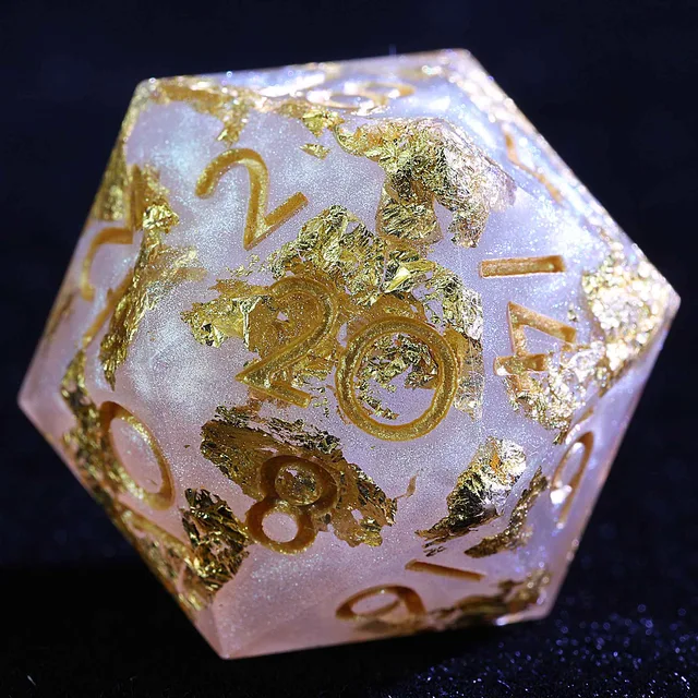 Close-up of a pale lavender shimmering D20 with gold-coloured foil flecks and numerals.