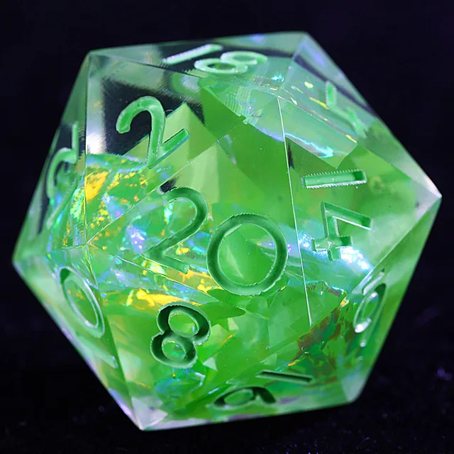 Close-up of a translucent green D20 with angular inclusions and iridescent flashes.