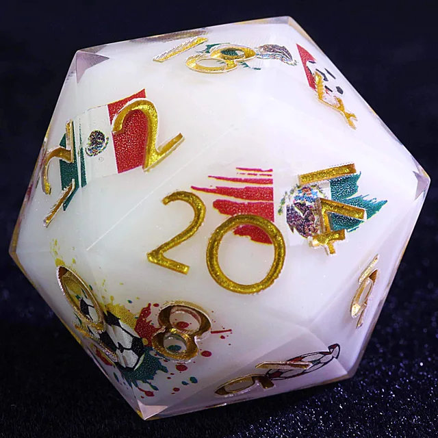 Close-up of a white D20 with gold numbers and green, red, and football graphics.