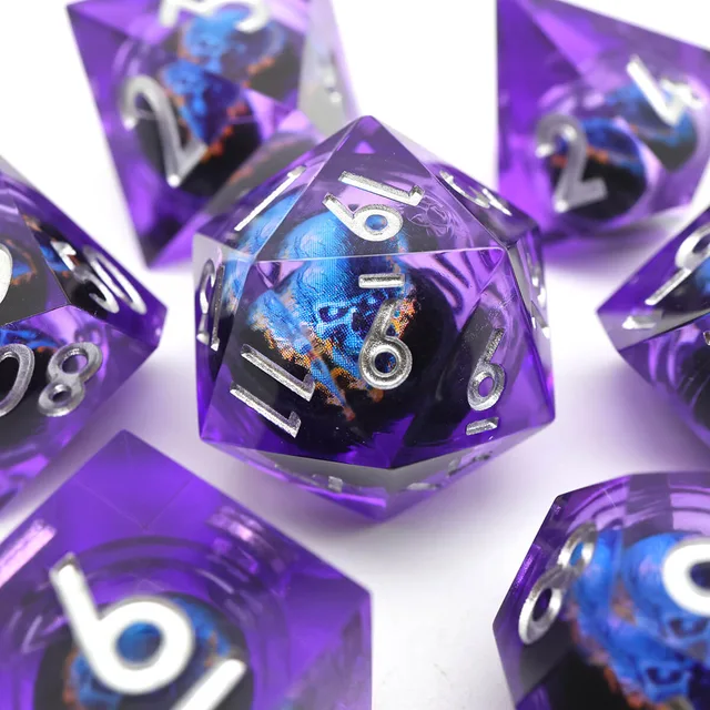 Close-up of a purple D20 with a blue-orange central orb and silver numbers.