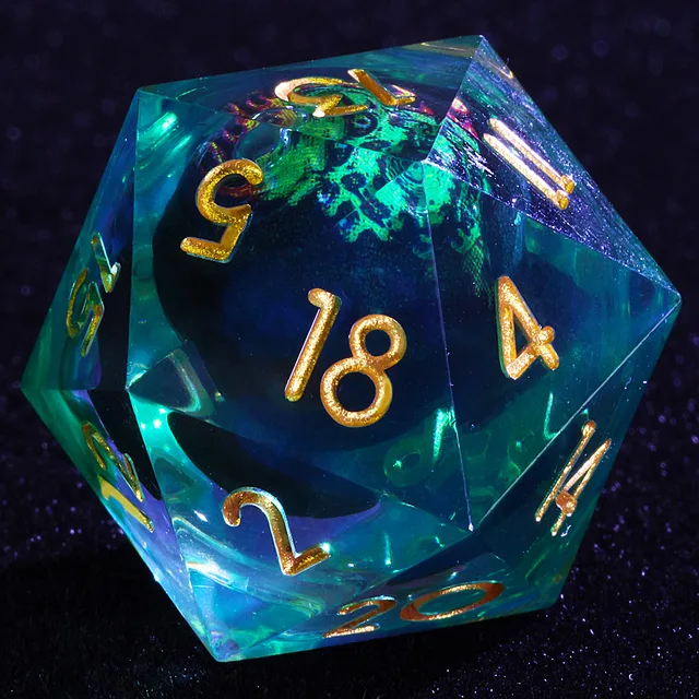 Close-up of a transparent blue-green D20 with gold numbers and a dark patterned core.