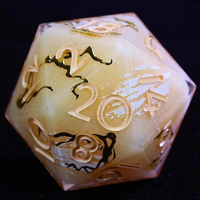 Close-up of a pale pink D20 with a golden centre, white and black marbling, and cream numerals.