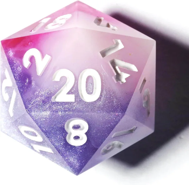 Close-up of a pink and purple glittered D20 with white numbers