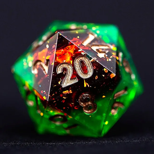 Close-up of a green and dark red D20 on a dark surface.