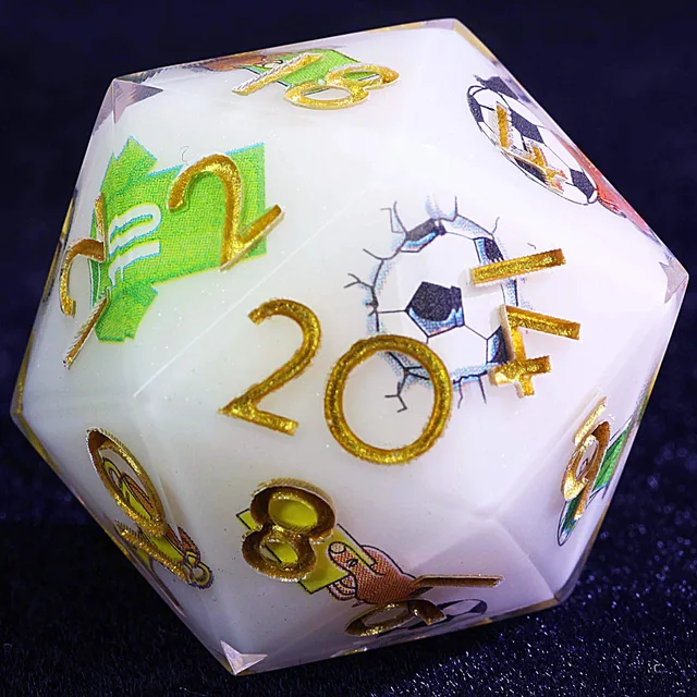 Close-up of a white D20 with gold numbers, a soccer ball and green jersey graphics.