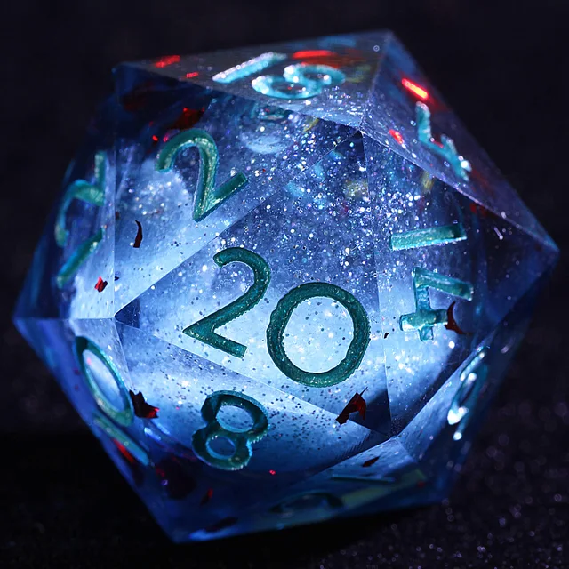 Close-up of a translucent blue liquid-core D20 with teal numerals and red flecks.