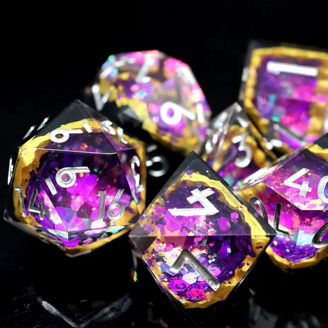 Close-up of matching purple-flecked polyhedral dice on black.