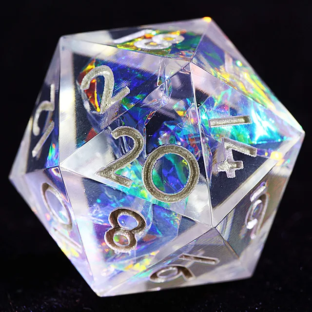 Close-up of a clear D20 with rainbow holographic inclusions and silver numbers.