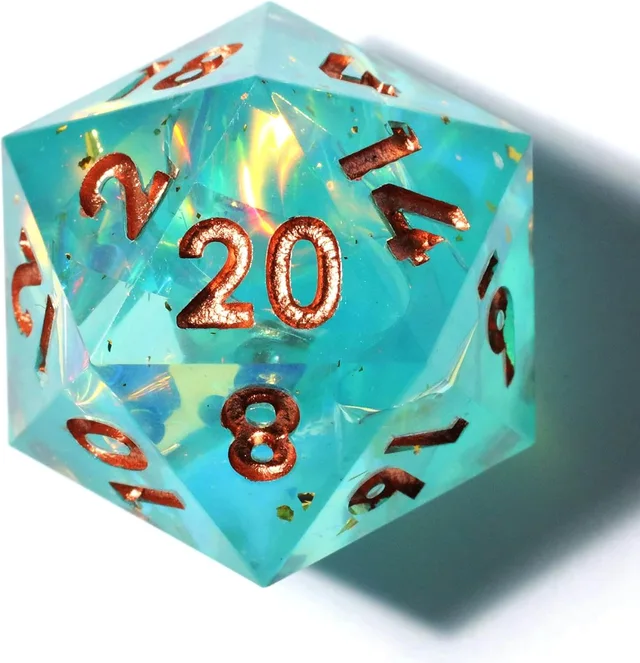 Close-up of a translucent turquoise D20 with copper-coloured numbers and iridescent flakes.
