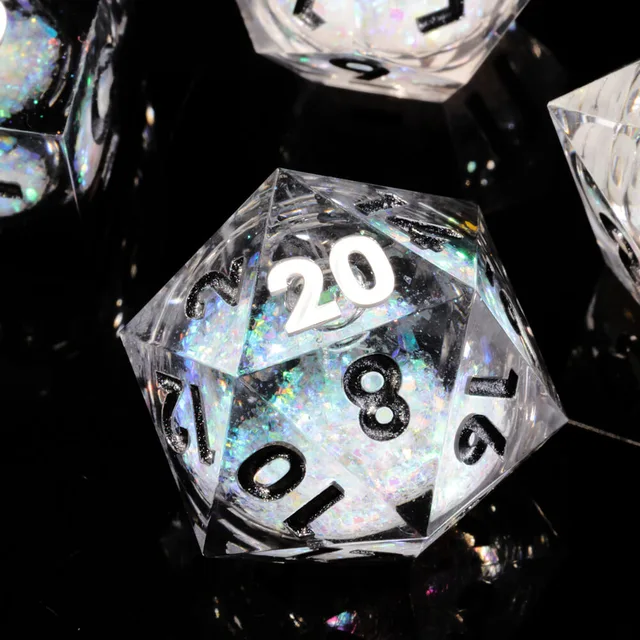 Close-up of the shimmering-core D20 with a white 20 and black numerals.