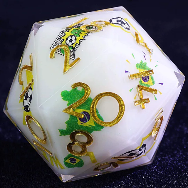 Close-up of a white D20 with gold numbers and Brazil football graphics.