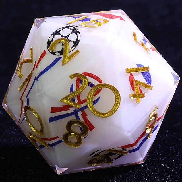 Close-up of a white D20 with gold numbers, red and blue streaks, and a football graphic.