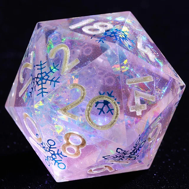 Close-up of a translucent lavender D20 with iridescent flakes, blue snowflakes and pale gold numbers.
