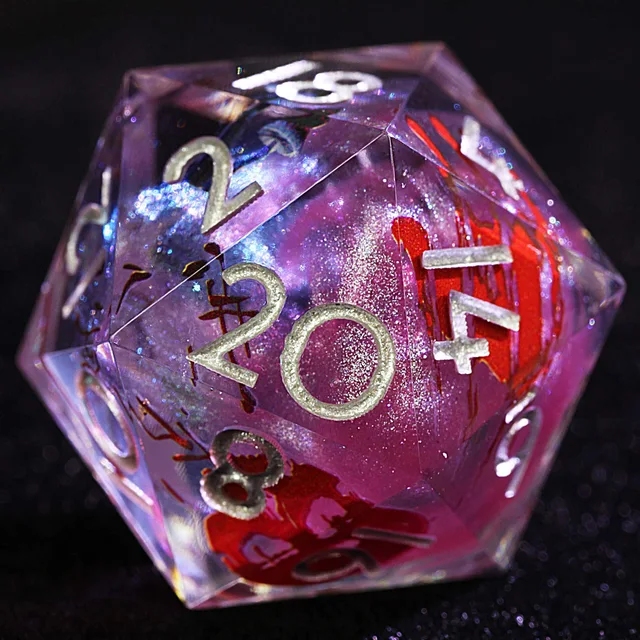 Close-up of a translucent pink D20 with red splatters and pale numerals.