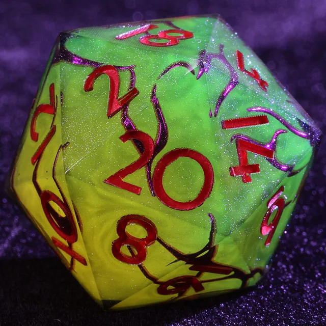 Close-up of a green and yellow D20 with red numerals, purple branching lines, and fine sparkle.