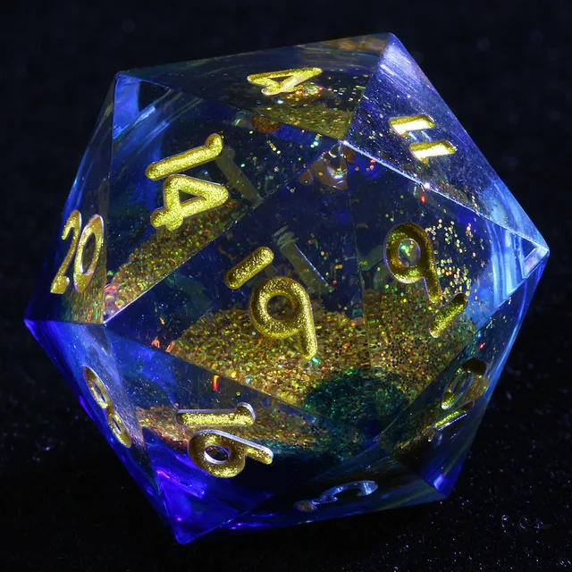 Close-up of a blue-tinted D20 with gold numerals and a glittering liquid core.