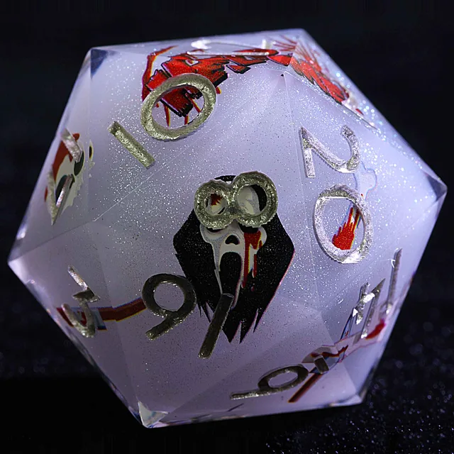 Close-up of a pale lavender-gray shimmering D20 with silver-toned numbers and a black-and-white hooded ghost face.