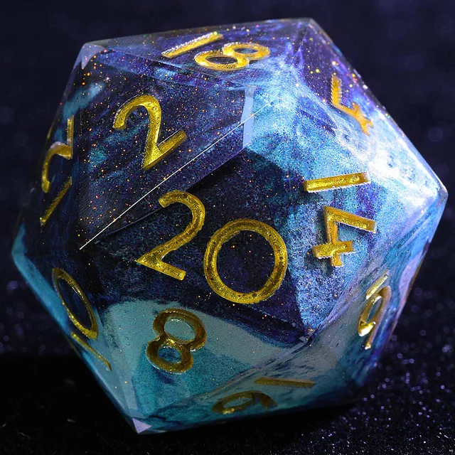 Close-up of a blue and teal marbled D20 with gold numbers and glitter flecks.