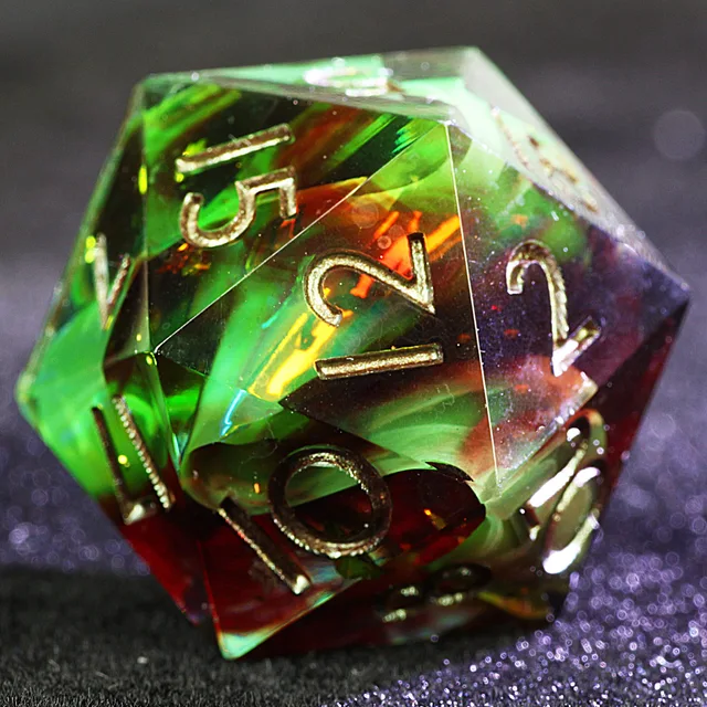 Close-up of a translucent green and red twenty-sided die with angular iridescence and silver numerals.