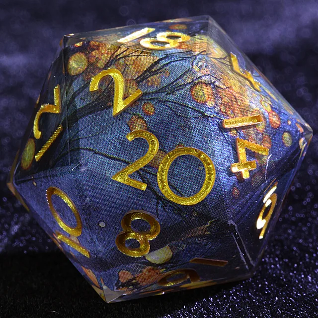 Close-up of a dark blue-black D20 with branching patterns, orange flecks and gold numbers.