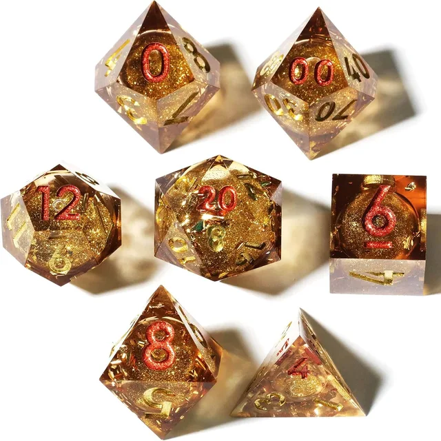 Seven transparent amber dice with gold glitter cores and red and gold numbers on white.