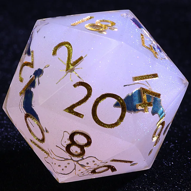 Close-up of a pale translucent D20 with gold numbers and blue decorative shapes.