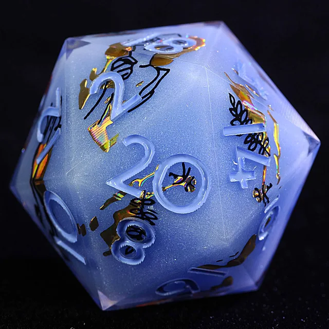Close-up of a pale blue D20 with white numerals, black linework and iridescent gold flecks.