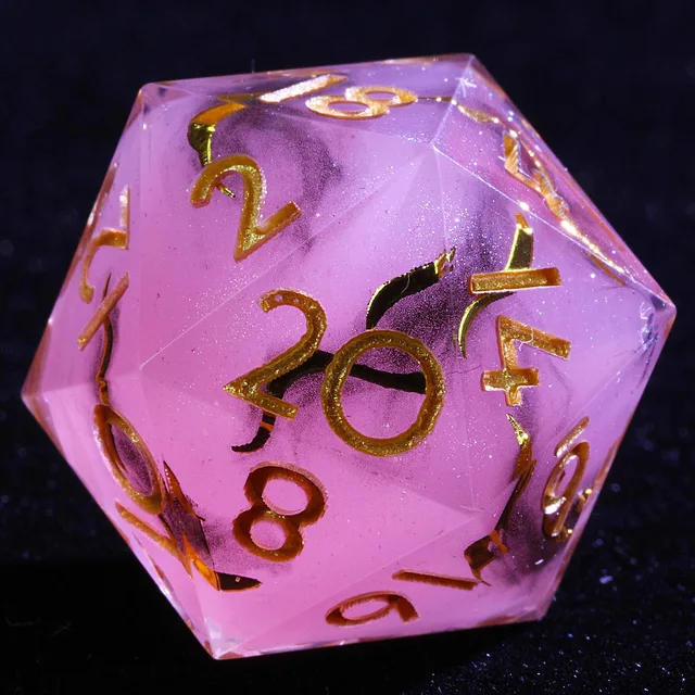 Close-up of a translucent pink-purple D20 with dark swirls, sparkle and gold numbers.