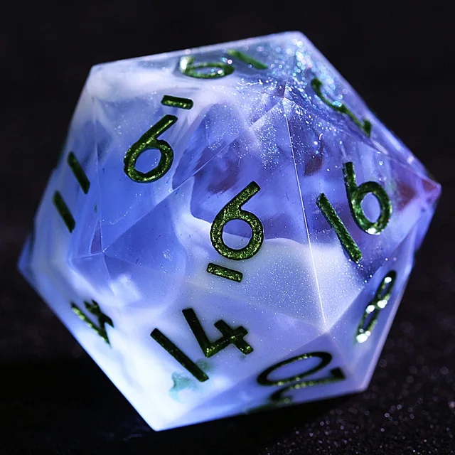 Close-up of a lavender-blue D20 with cloudy swirls, glitter and green numbers