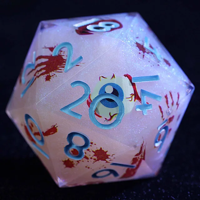 Close-up of a pink-lilac glitter D20 with blue numerals, an eyeball graphic and red splatters.