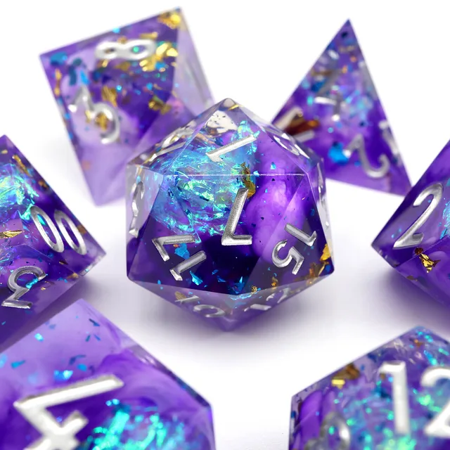 Close-up of a purple D20 with iridescent blue flecks among matching dice.
