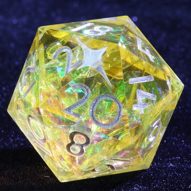 Close-up of a golden translucent D20 with iridescent flecks, silver-colored numbers and a star marking.