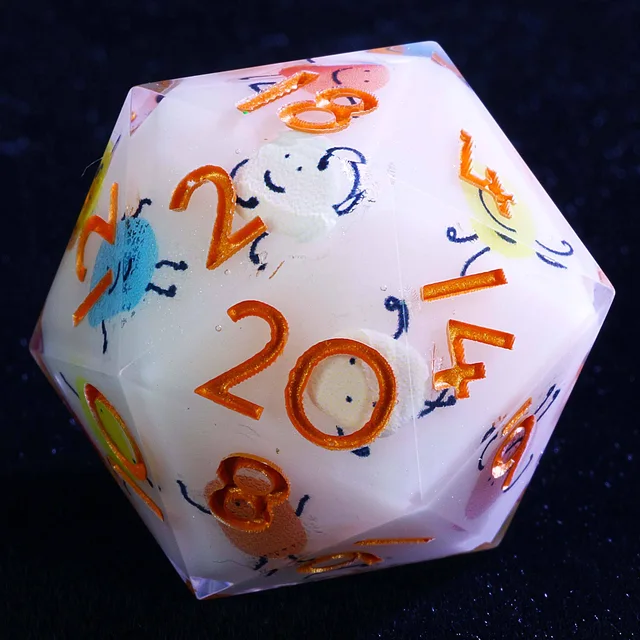 Close-up of a white D20 with orange numbers and pastel smiling figures.