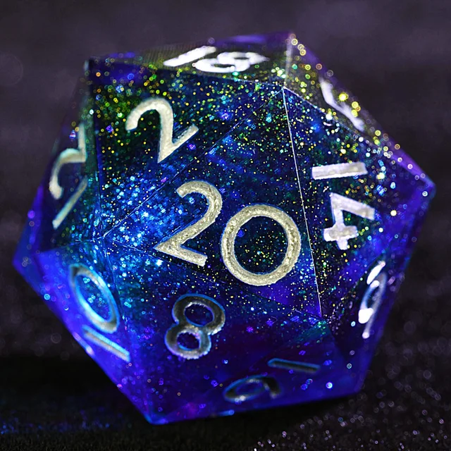 Close-up of a blue and purple glitter-filled D20 with pale numerals.