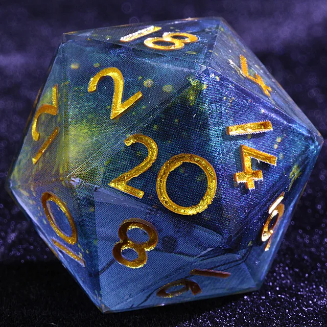 Close-up of a dark blue-green D20 with gold numbers and translucent edges.
