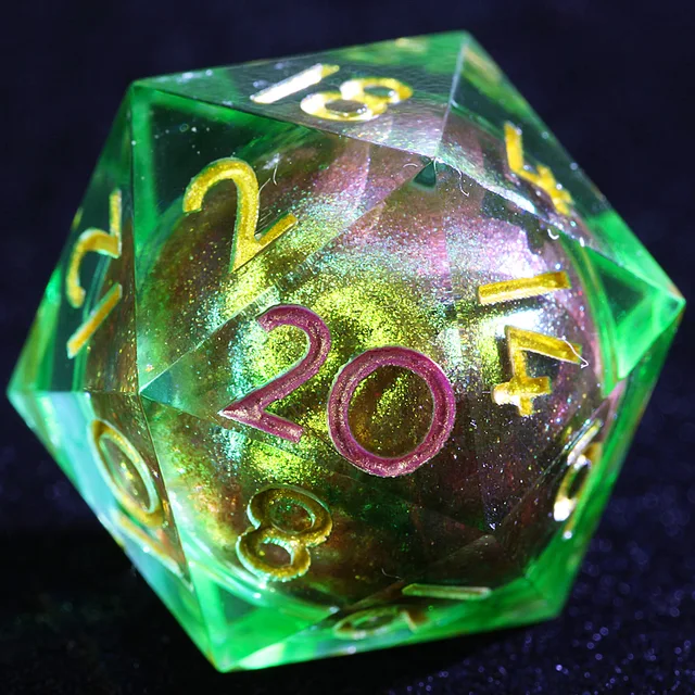 Close-up of a green-tinted liquid-core D20 with a shimmering centre and pink 20.
