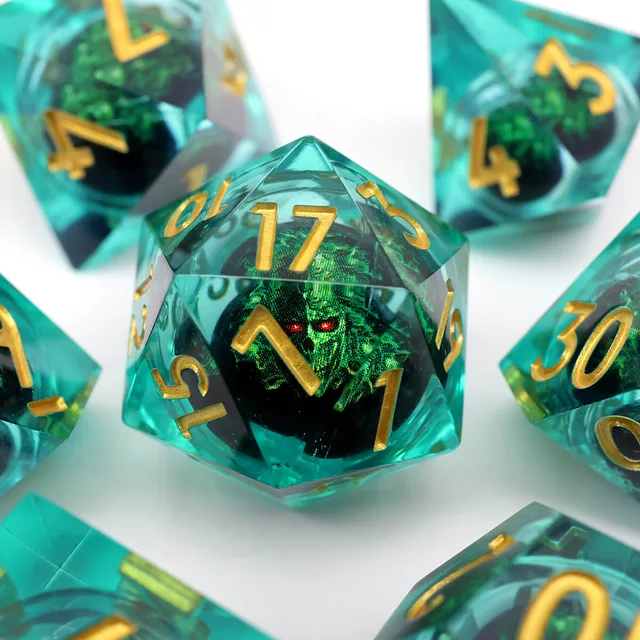 Close-up of a turquoise-green dragon-eye D20 with gold numbers.