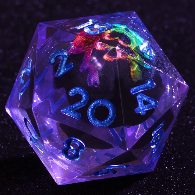 Close-up of the clear D20 with blue numerals and a multicoloured skull core.