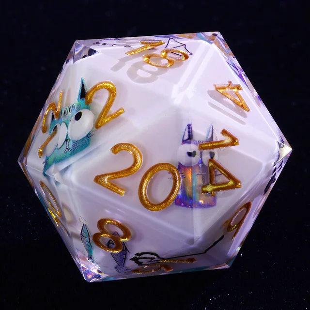 Close-up of the white D20 with blue and purple cats and glittering gold numbers.
