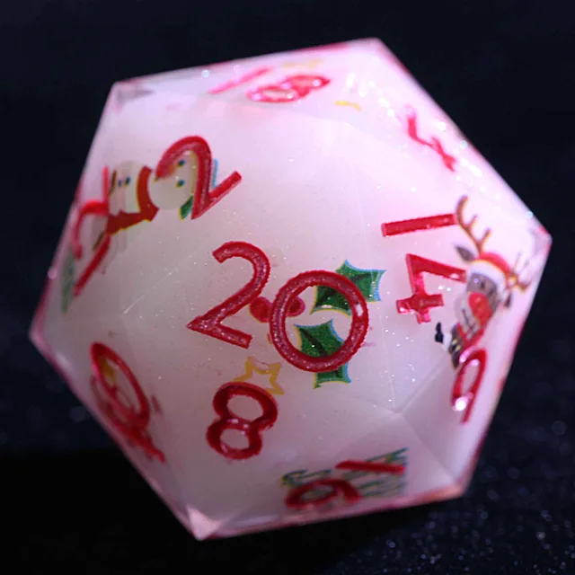 Close-up of a pale Christmas-themed D20 with red numbers, holly and festive illustrations.