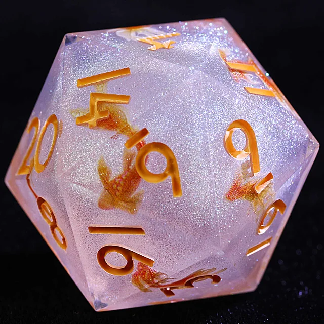 Close-up of a glittering pale lavender D20 with orange-gold numbers and fish designs.