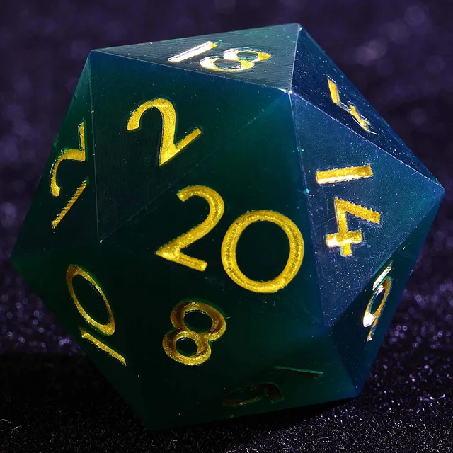 Close-up of a dark blue-green D20 with gold numbers and fine flecks.