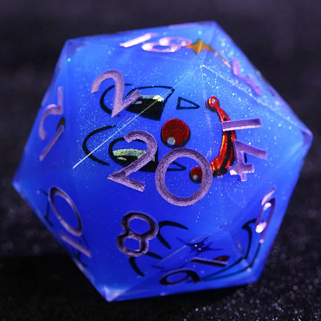 Close-up of a glittery blue D20 with pale numbers and a smiling-face design.