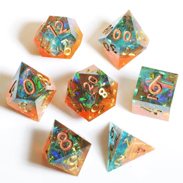Seven teal-blue and orange sharp-edged dice with iridescent inclusions on white.