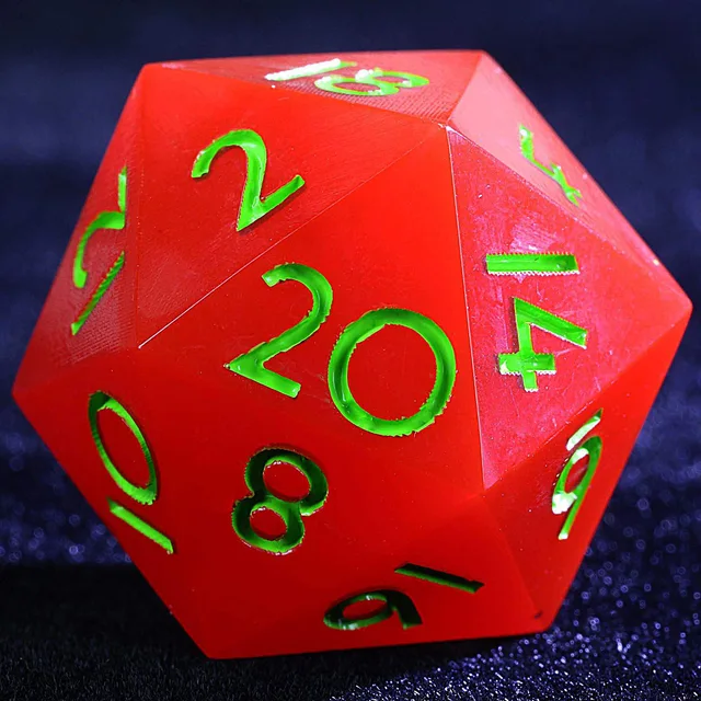 Close-up of a red twenty-sided die with green numerals.