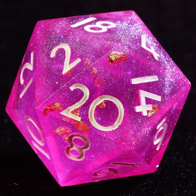 Close-up of a pink-purple glitter D20 with gold-coloured flakes and white numerals.