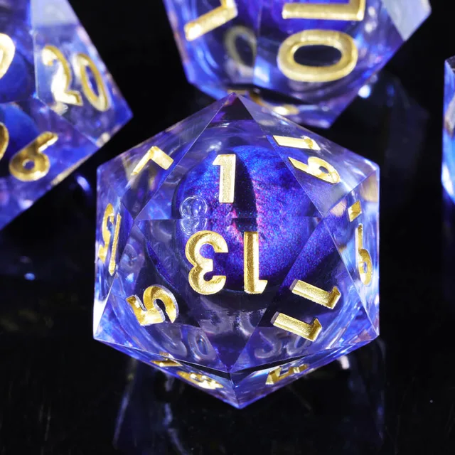 Close-up of a purple liquid-core D20 with gold numbers.